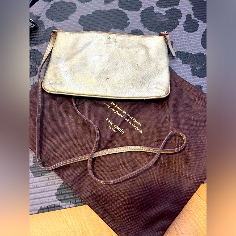 Kate spade gold metallic, very used crossbody with dust bag.